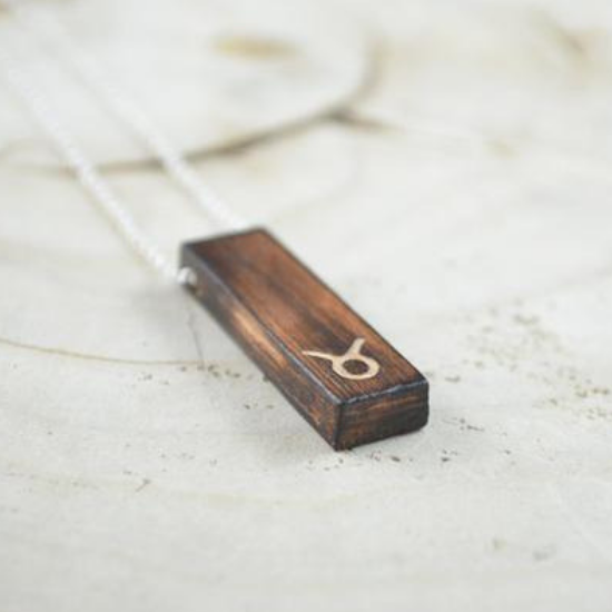 https://www.etsy.com/listing/607409002/recovered-wooden-necklace-astrological?ga_order=most_relevant&ga_search_type=all&ga_view_type=gallery&ga_search_query=TAURUS+WOODEN+JEWELRY&ref=sr_gallery-1-23&organic_search_click=1